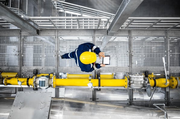 construction_worker_holding_tablet